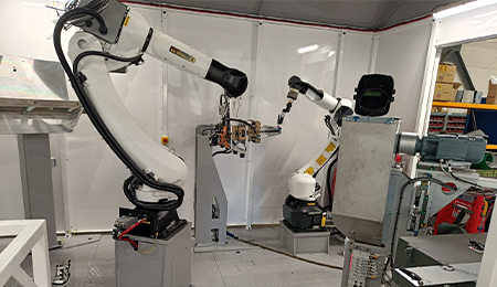 Cellule bi-robot de soudure bandeaux